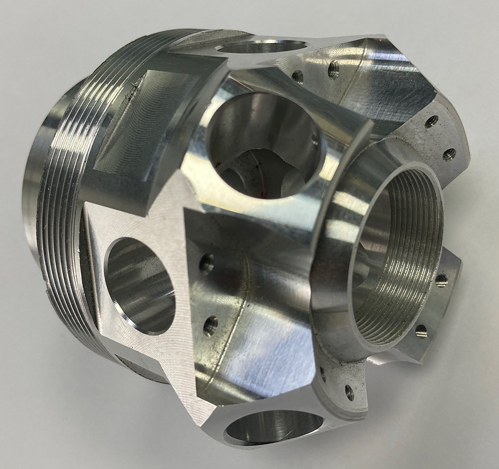 Piesă executată pe strung cu frezare pe axa Y