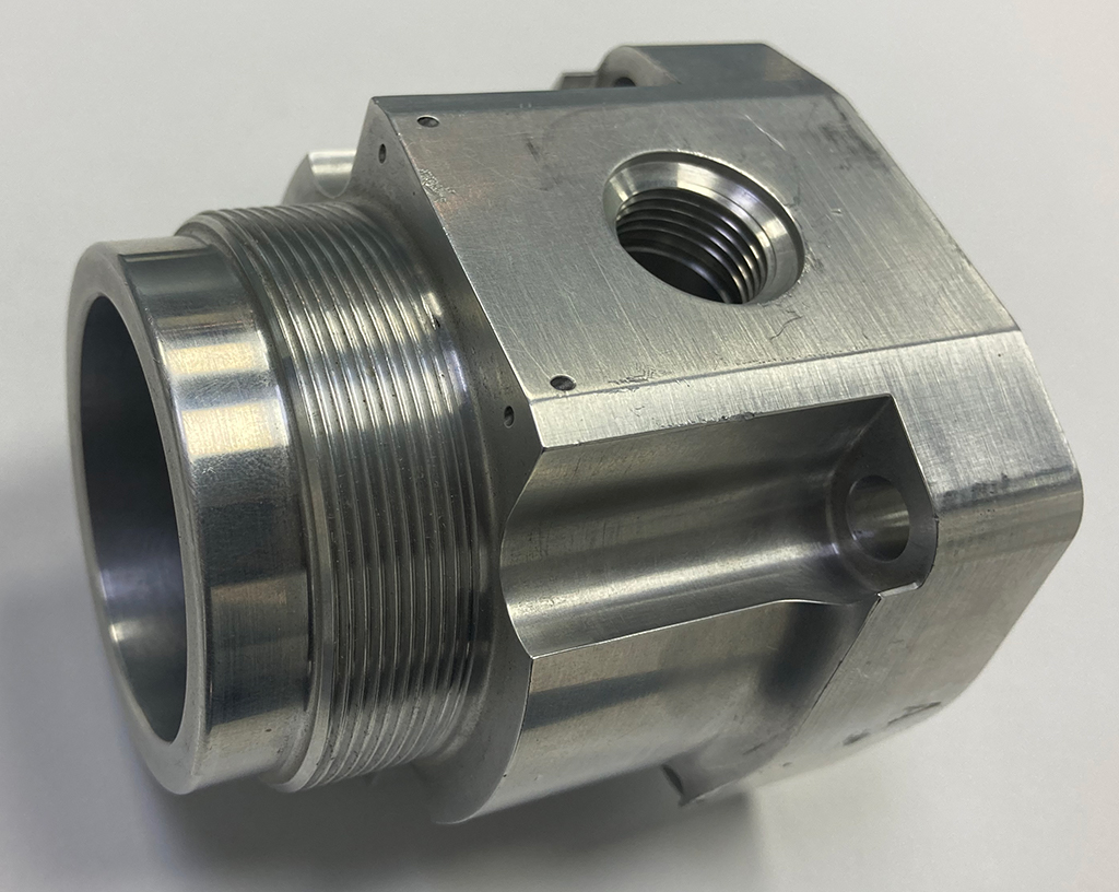 Piesă executată pe strung cu frezare pe axa Y